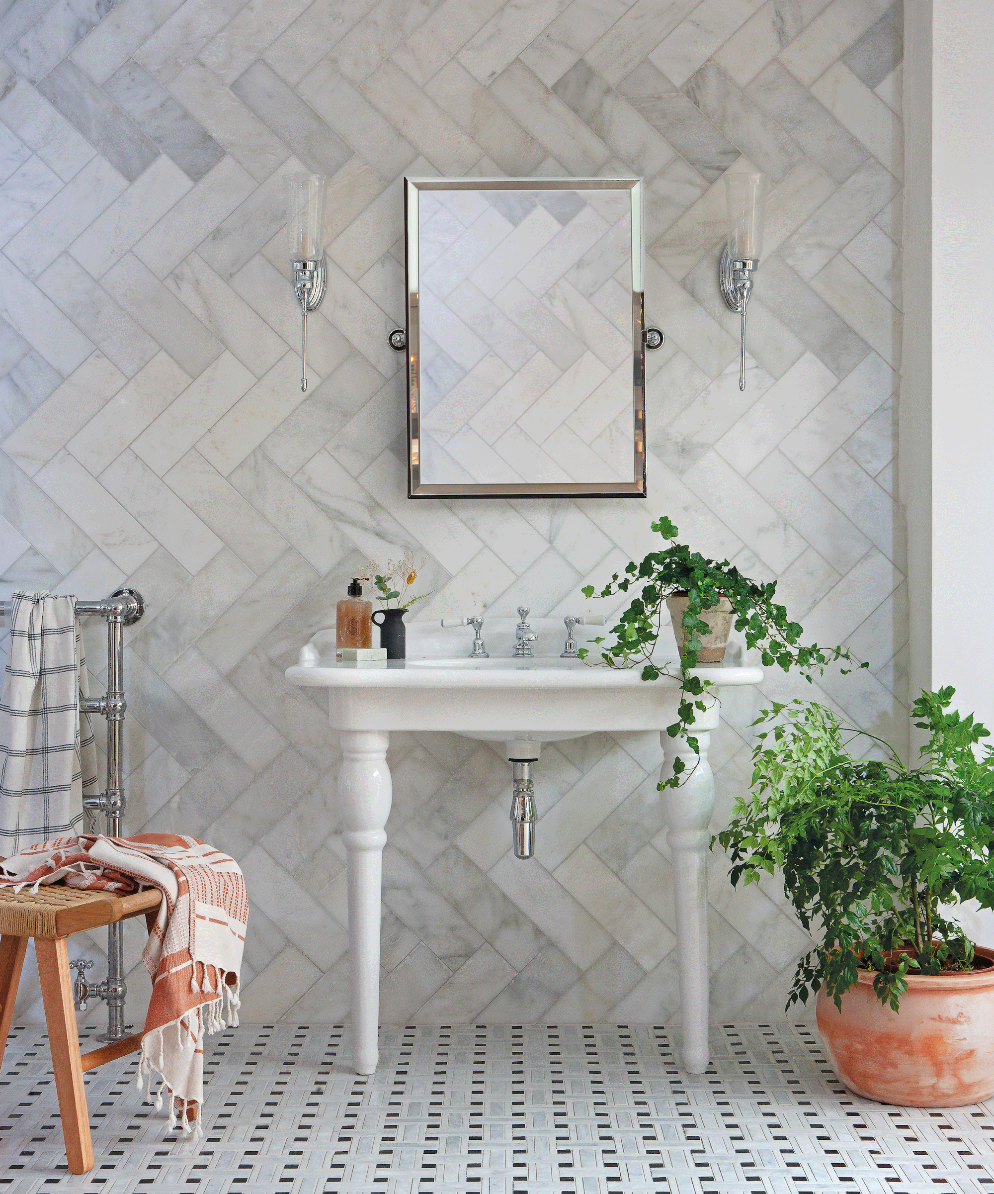 Bathroom with marble flooring in basketweave design
