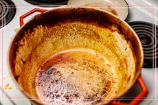 A close up of a dirty casserole dish