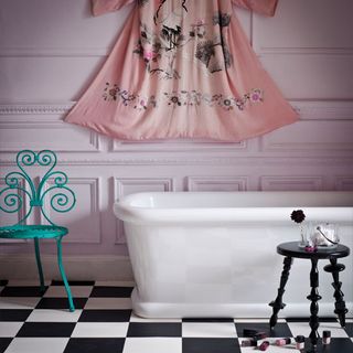 pink bathroom with japanese themed accessories