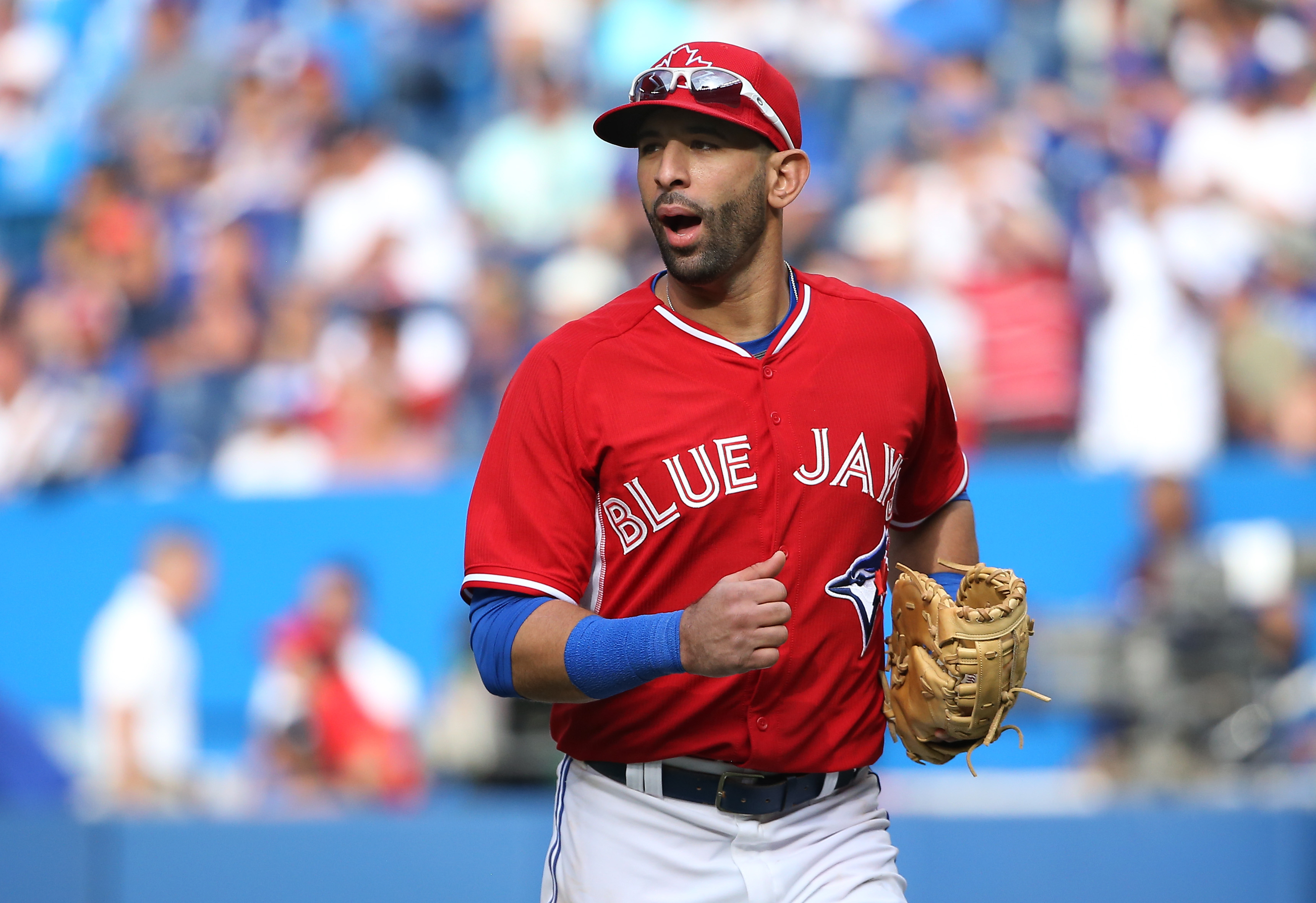 Jose Bautista of the Toronto Blue Jays wears the new red jersey worn  News Photo - Getty Images