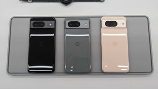 an image of 3 Google Pixel 8 phones