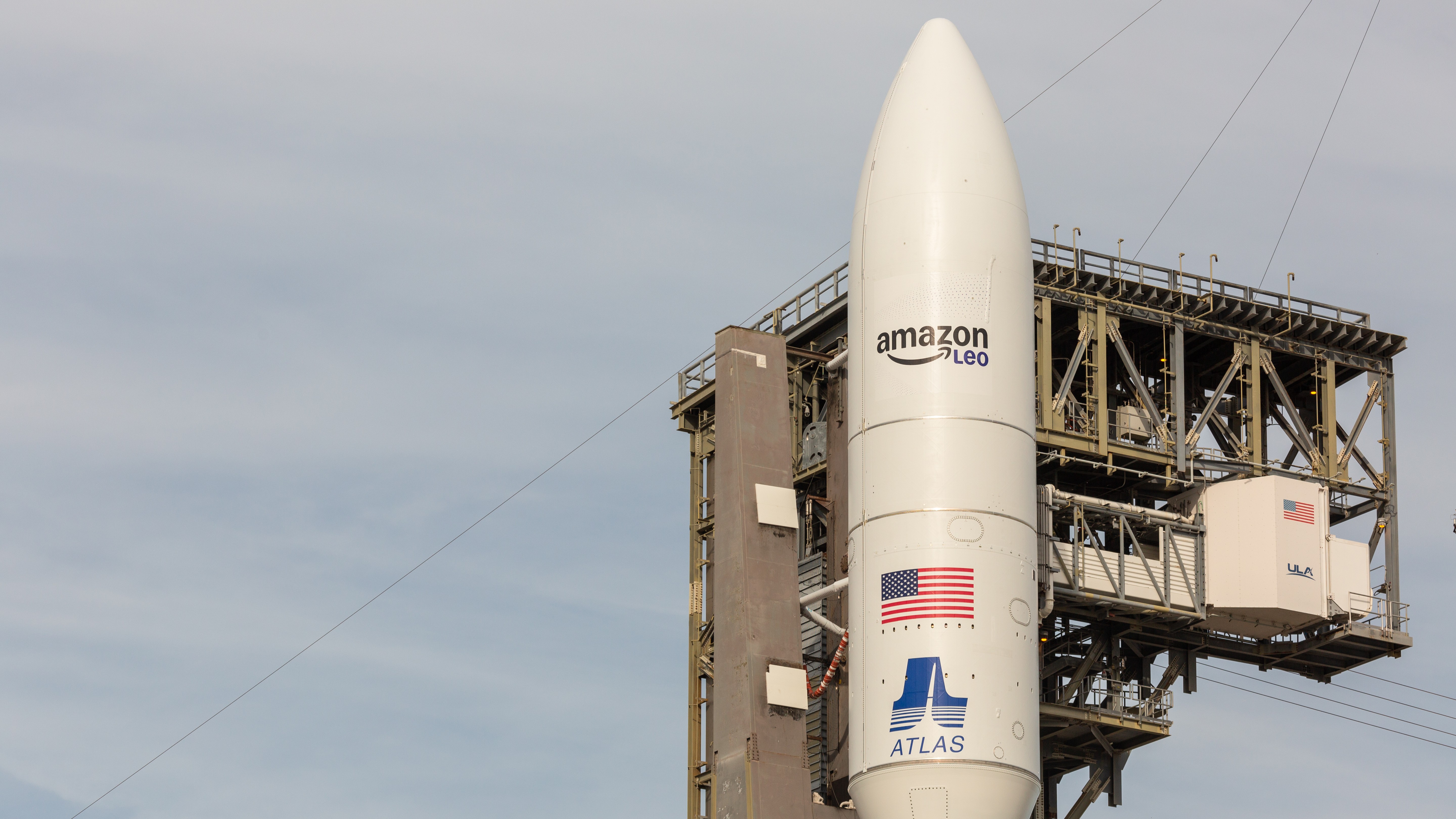 A ULA Atlas V-551 rocket stands showing the new Amazon Leo logo, December 14, 2025. 