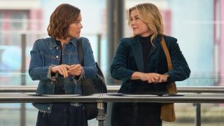 Ashley Williams as Anna and Alison Sweeney as Erica look at each other in a scene from To Barcelona, With Love.