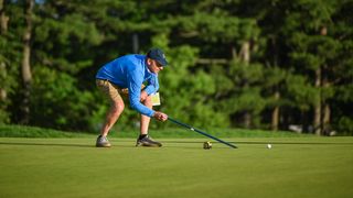 A stimpmeter being used for the US Open