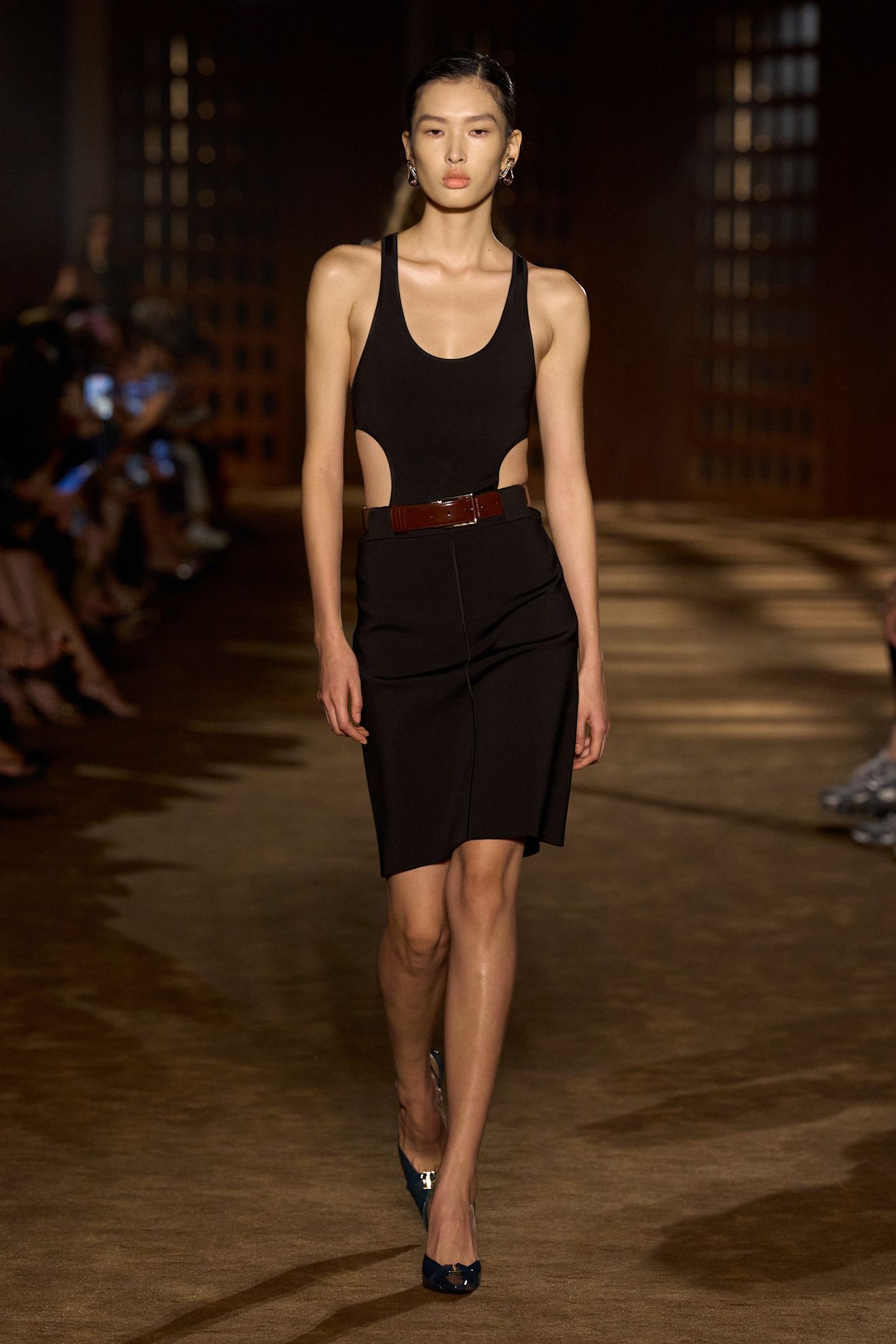 A model wore Dua Lipa's cut-out little black dress during the Ferragamo Spring 2027 show