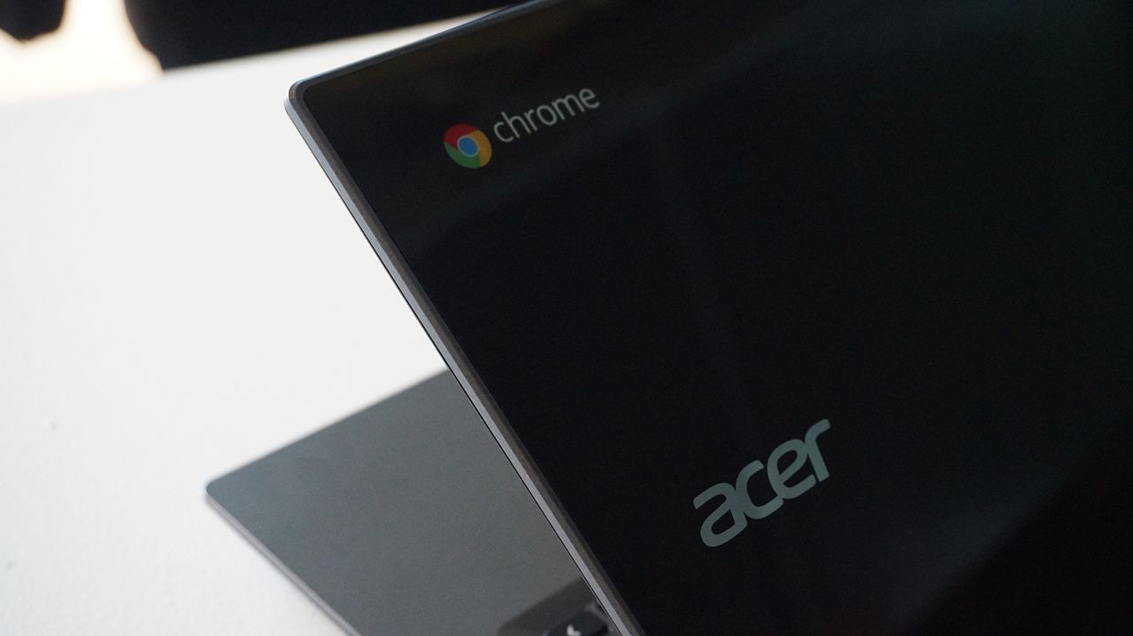 A close-up of the Acer and Google Chrome logos on the lid of the Acer Chromebook 14 for Work