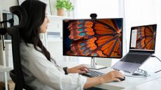 Woman using a Dell Pro 7 laptop