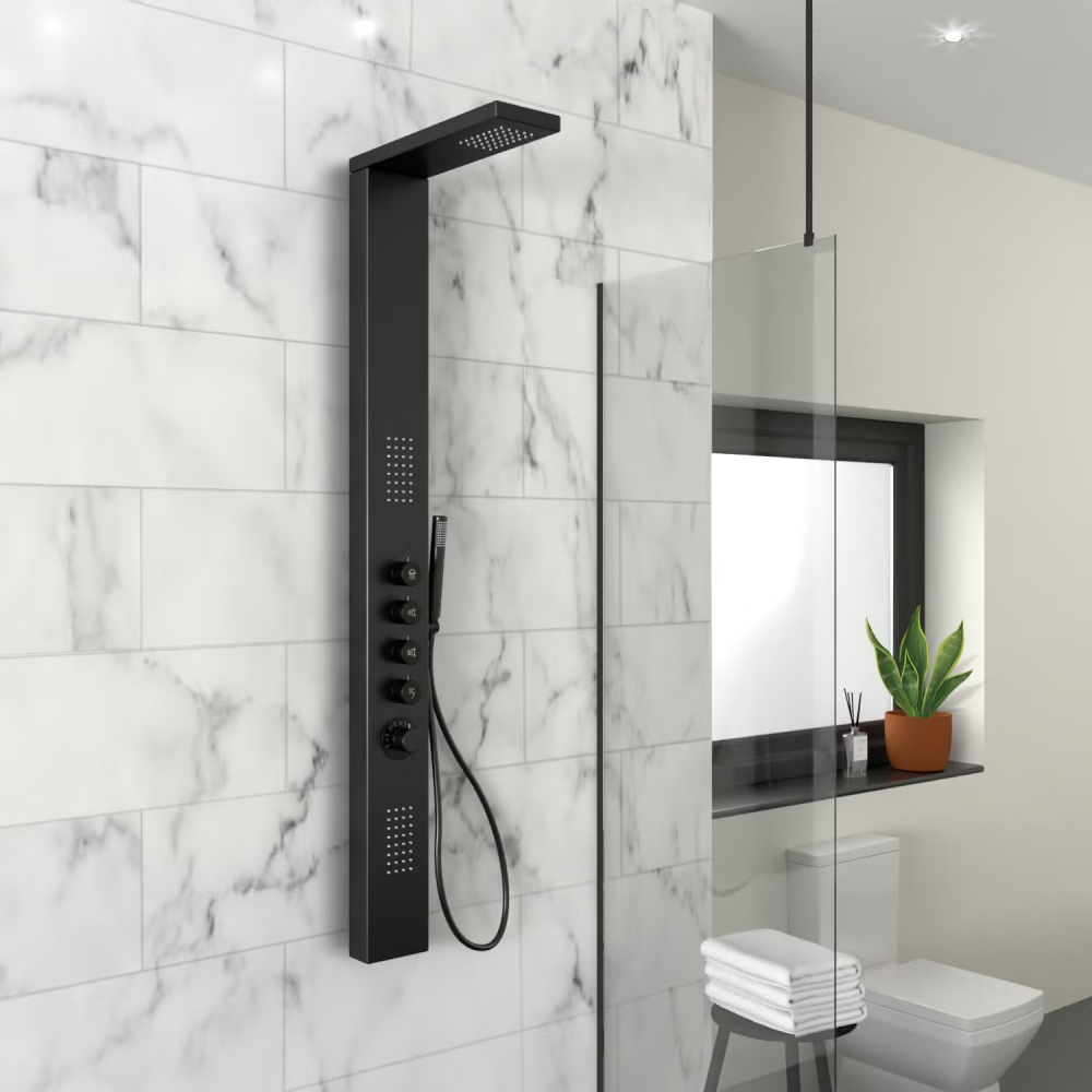 black shower tower on marble effect tiles in bathroom