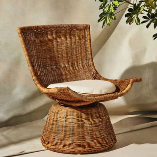 Rattan swivel chair on Black Friday offer at Anthropologie
