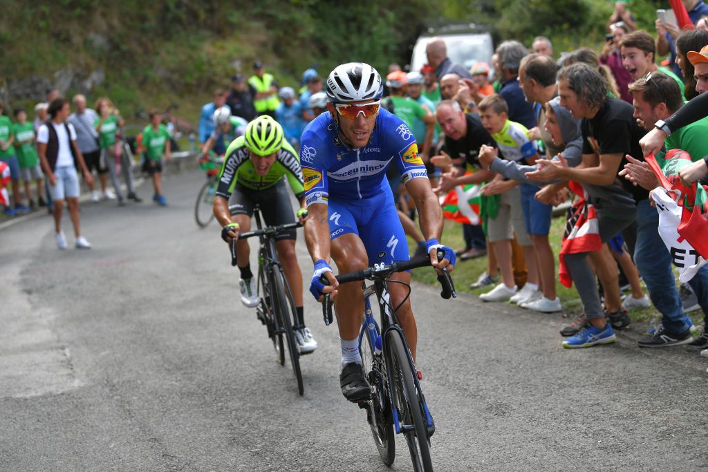 Philippe Gilbert (Deceuninck-Quickstep) attacks on the final climb of stage 12
