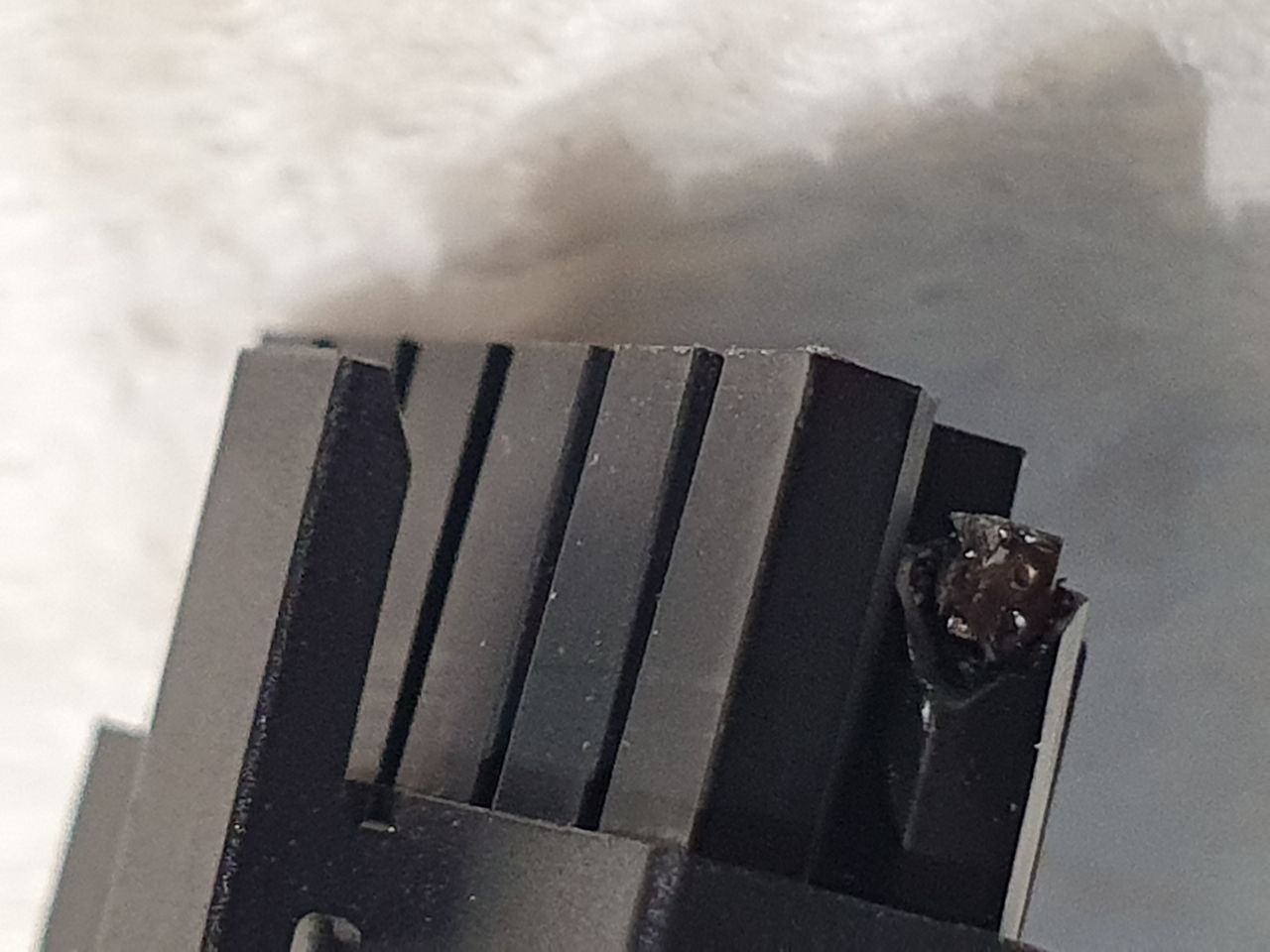 Melted cable connectors on the RTX 4090's 12VHPWR from DSOGaming