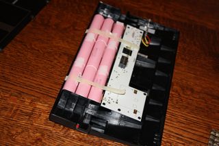 The extra nine cells inside the extended battery pack