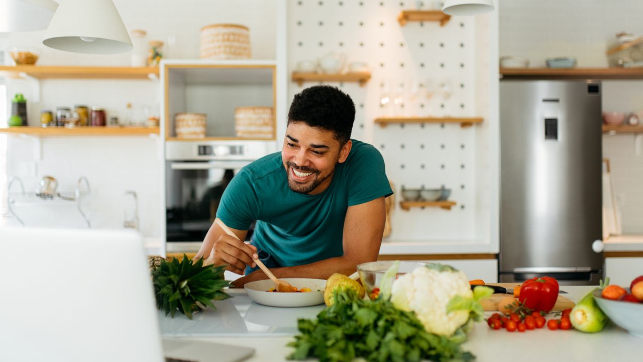 Man preparing a vegan meal