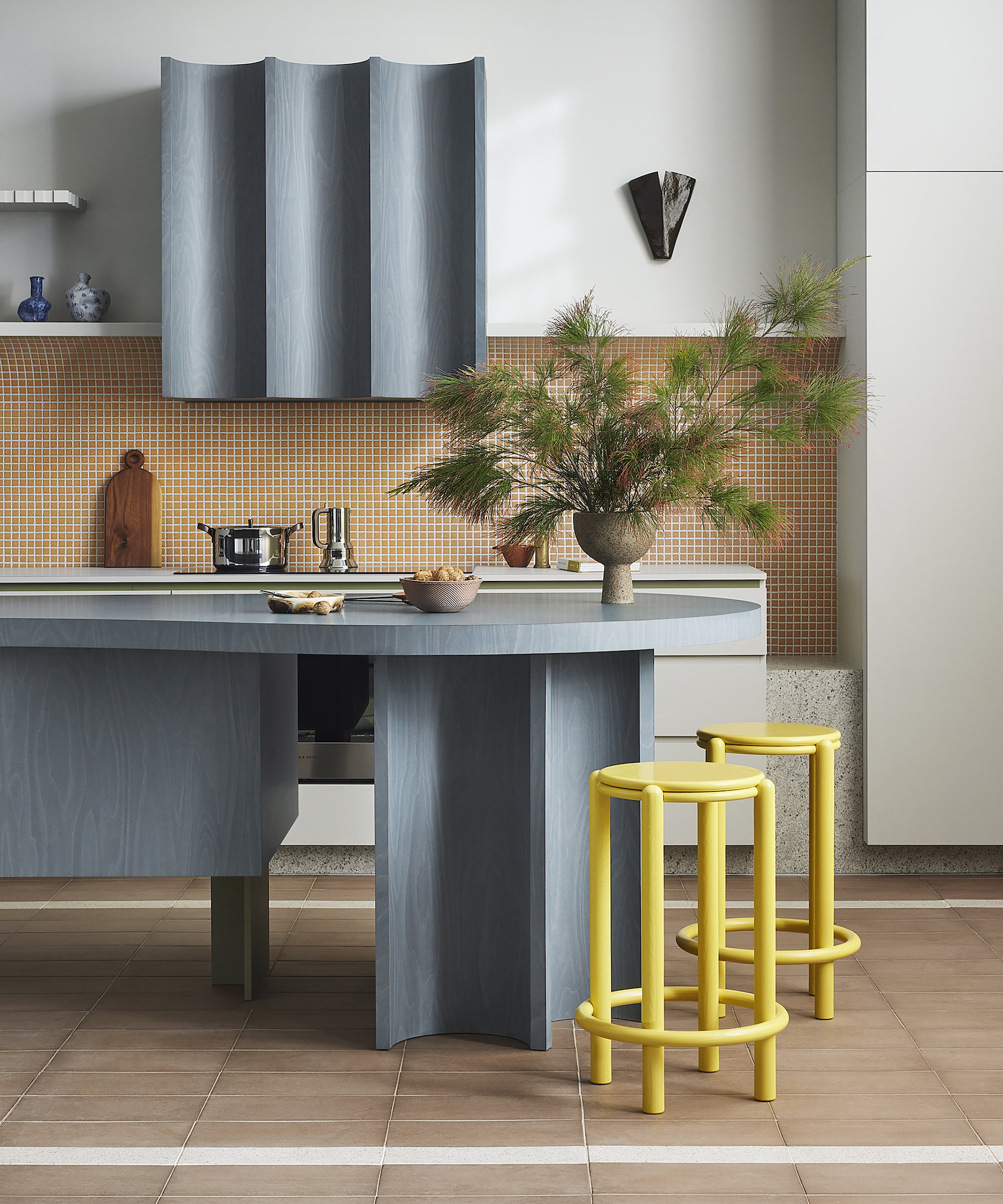 kitchen with island and yellow stools