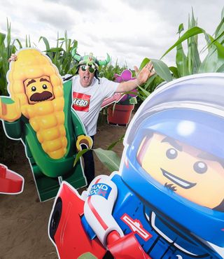 Man with Lego cut-outs in Lego Maze