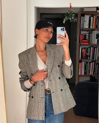 A fashion person in a double-breasted blazer