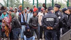 Migrants being detained at Calais