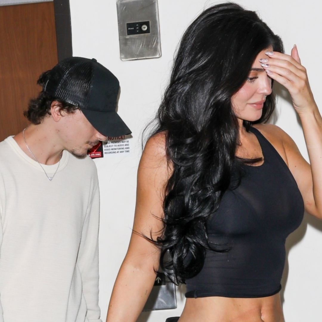 Kendall Jenner third-wheeled Kylie Jenner and Timoth&eacute;e Chalamet's date in a leather blazer, straight-leg jeans, and the high-vamp flats trend