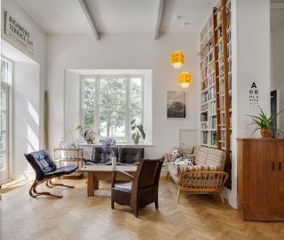 Open plan living room in a renovated school house