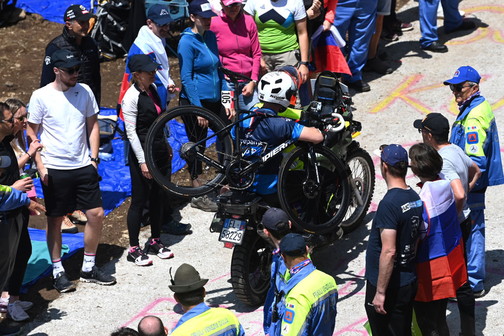 Motorbike support for riders on stage 20's uphill time trial of the 2023 Giro d'Italia