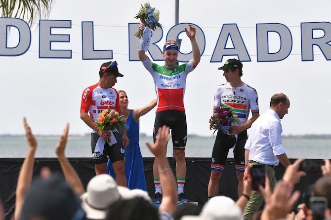 Elia Viviani (Deceuninck-QuickStep) celebrates his win at the 2019 Cadel Evans Great Ocean Road Race alongside second-placed Caleb Ewan (Lotto Soudal) and Mitchelton-Scott's Daryl Impey
