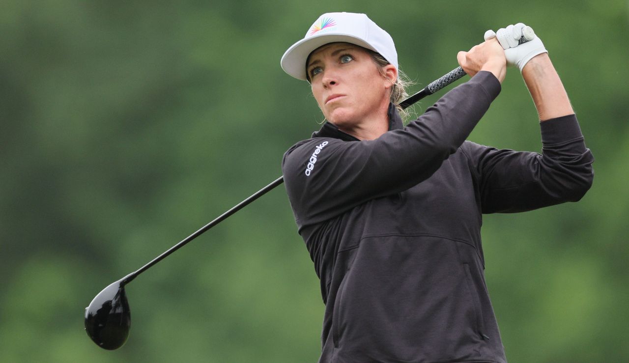 Mel Reid hits a driver and watches her tee shot