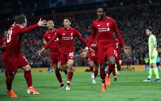 Liverpool players celebrate Divock Origi's decisive goal against Barcelona
