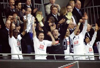 Tottenham players celebrate their League Cup final win over Chelsea in February 2008.