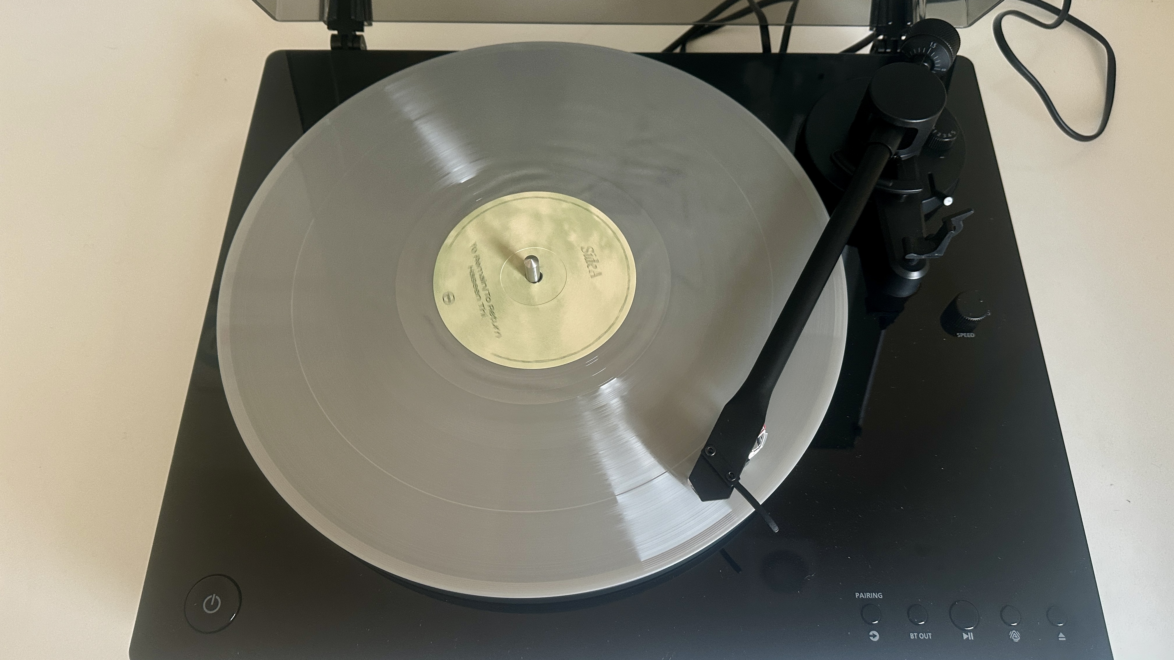 Philips Fidelio FT1 turntable closeup showing the tonearm, plinth, stylus and CD mechanism