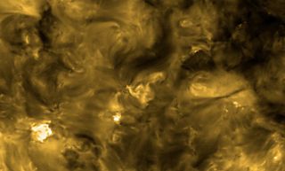 An image taken by the Solar Orbiter on May 30, 2020, shows a high-resolution view of the sun in ultraviolet, letting scientists study the star's incredibly hot outer atmosphere, or corona.