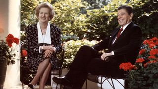Margaret Thatcher sits with Ronald Reagan