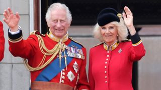 LONDON, ENGLAND - JUNE 17: King Charles III and Queen Camilla wave as they watch the fly-past on the Buckingham Palace balcony during Trooping the Colour on June 17, 2023 in London, England. Trooping the Colour is a traditional parade held to mark the British Sovereign's official birthday. It will be the first Trooping the Colour held for King Charles III since he ascended to the throne.