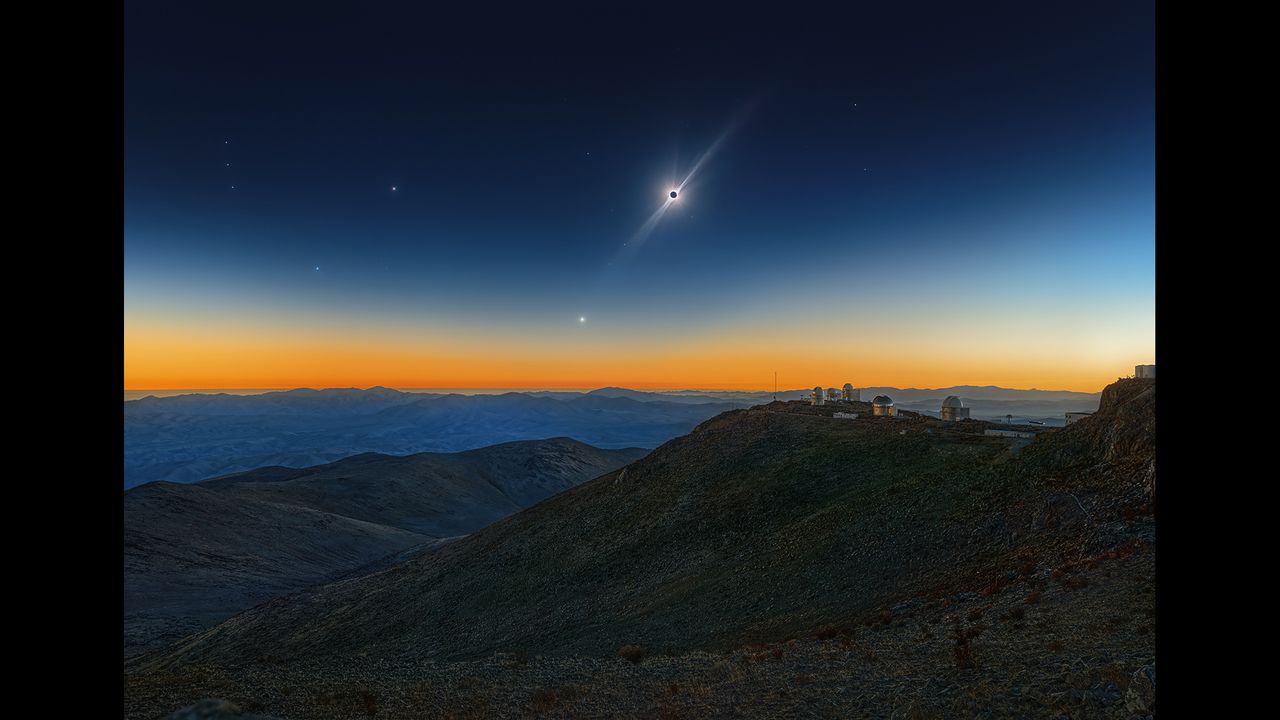 The 50th Anniversary of ESO's La Silla Observatory culminated with a breath-taking and very clear Total Solar Eclipse. In a very long process, the photographer calibrated, aligned and stacked 96 frames together, revealing the streamers and the faint corona. Stars also became visible, especially the red giant Betelgeuse (left) which started dimming in the months after. For the different star brightnesses of the tiny star dots the photographer used his action set RealStars; so he was able to show the brightness of Betelgeuse in comparison to Bellatrix and the other stars during daytime.