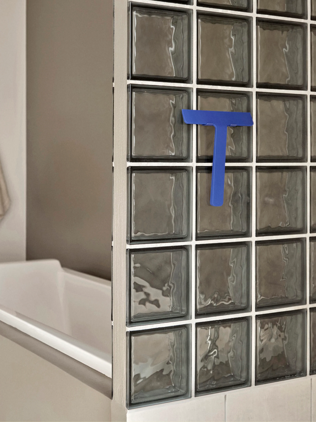 A blue squeegee from Zone Denmark
