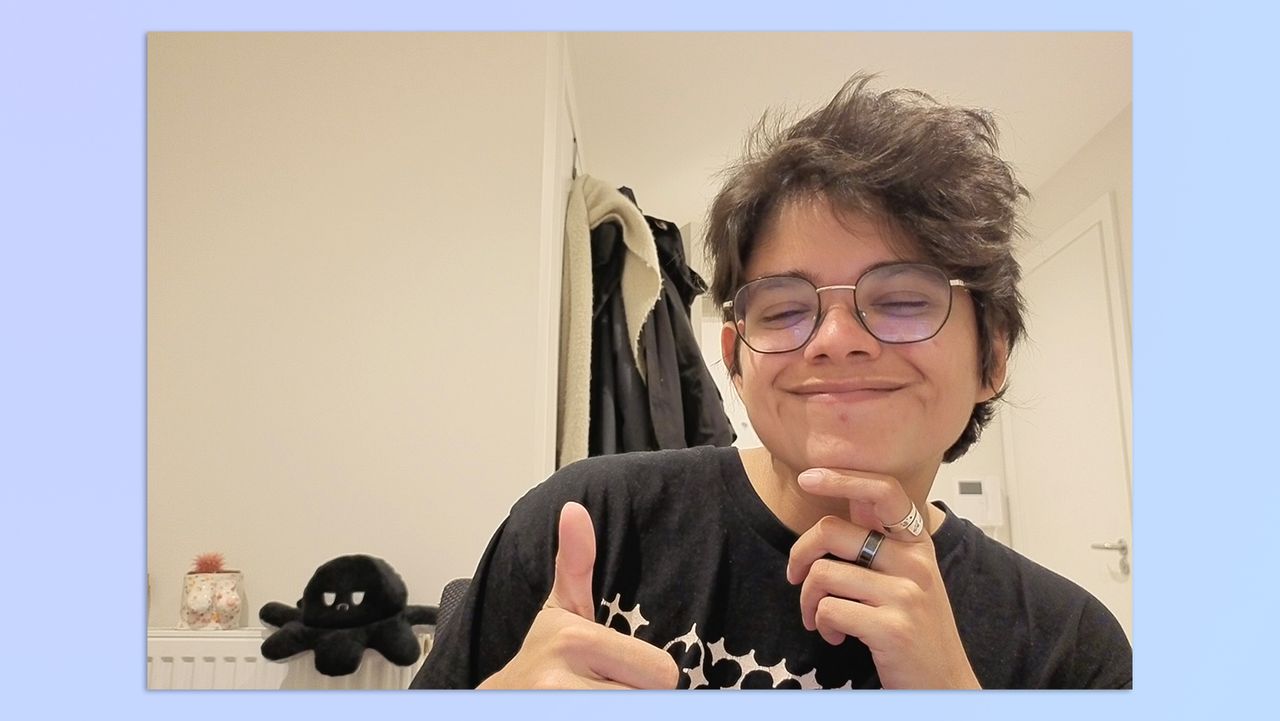 A photo of a woman with short hair, taken with the Insta360 Link 2C webcam