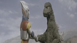 Godzilla shaking hands with Jet Jaguar in Godzilla vs. Megalon
