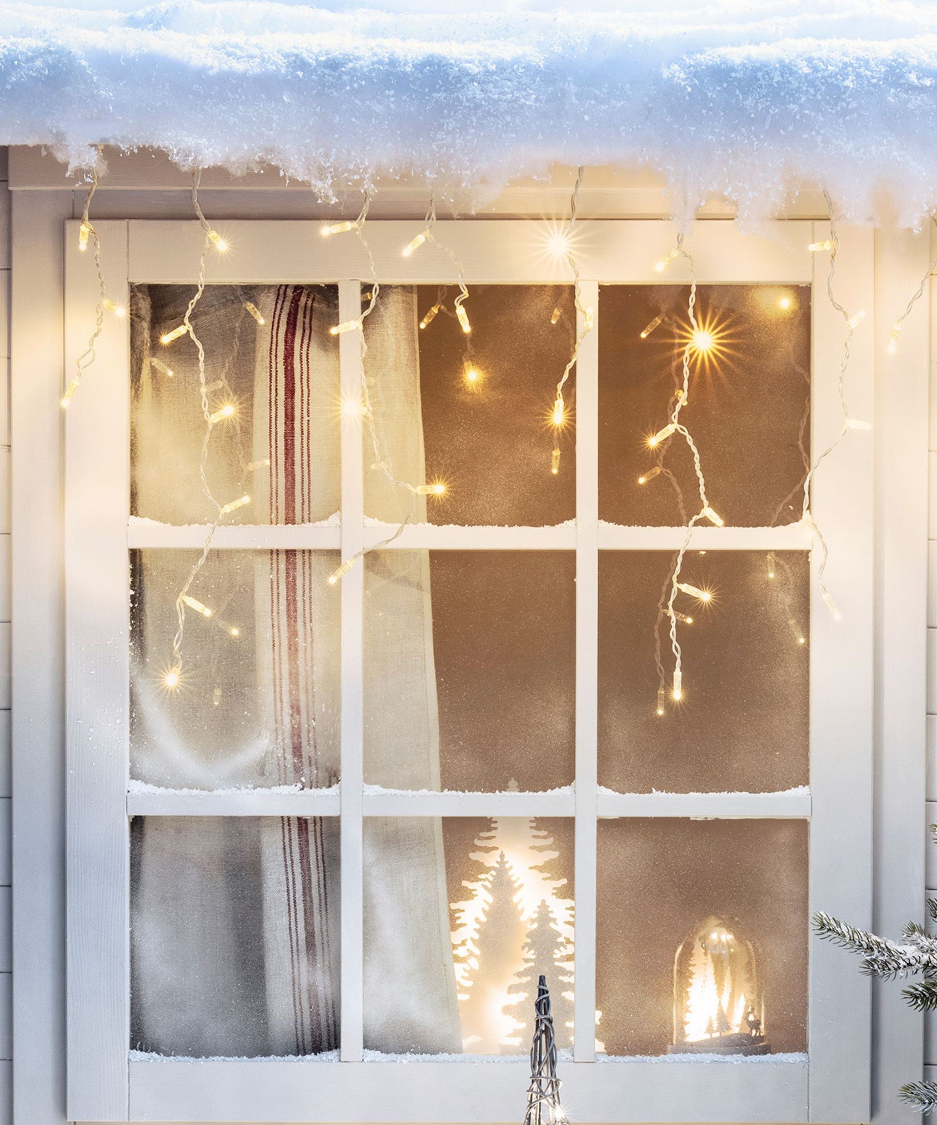 How to hang Christmas lights around the home and outside, too Homes & Gardens
