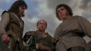 Mandy Patinkin, Wallace Shawn, and Andre The Giant looking down in The Princess Bride