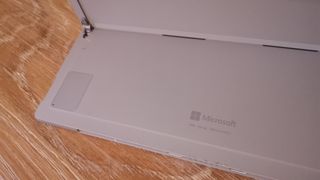 A Microsoft Surface Pro 7 Plus 's kickstand and SSD slot