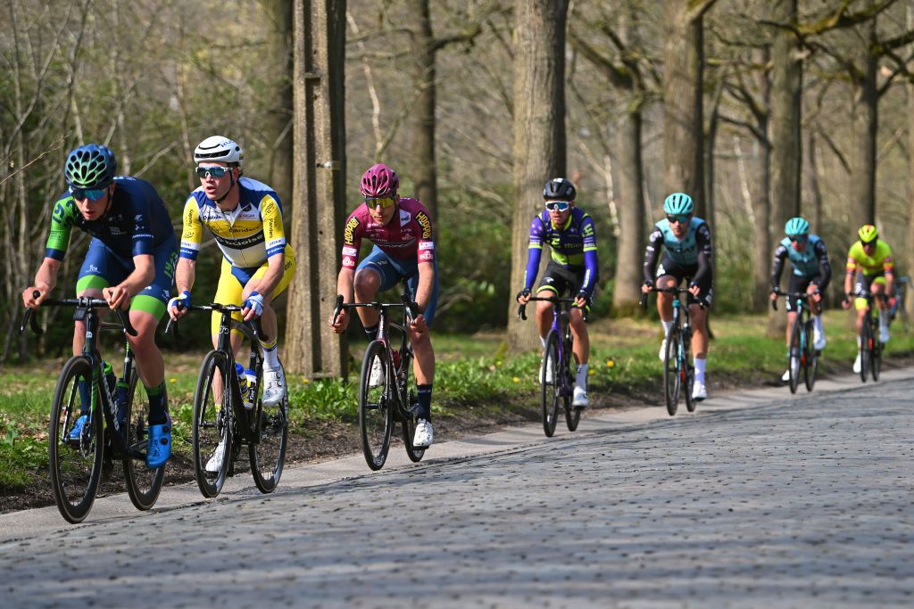 SCHOTEN BELGIUM APRIL 05 LR Ruben Apers of Belgium and Team Flanders Baloise and Giulio Masotto of Italy and Team Corratec compete in the breakaway during the 111th Scheldeprijs 2023 Mens Elite a 2053km one day race from Terneuzen to Schoten on April 05 2023 in Schoten Belgium Photo by Luc ClaessenGetty Images