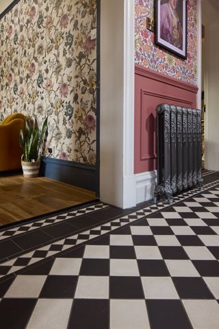 black and white tile flooring in hallway by Original Style