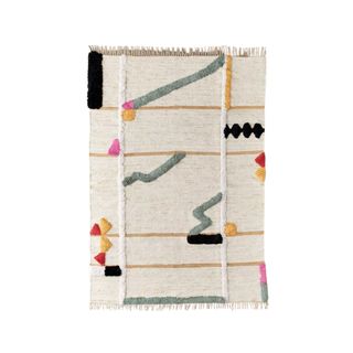 A white rectangle rug with colorful geometric patterns