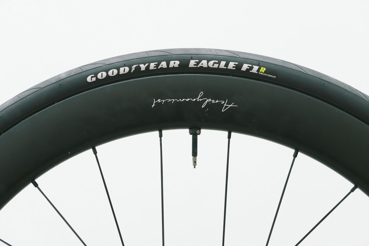 a close up of a black road bike tyre