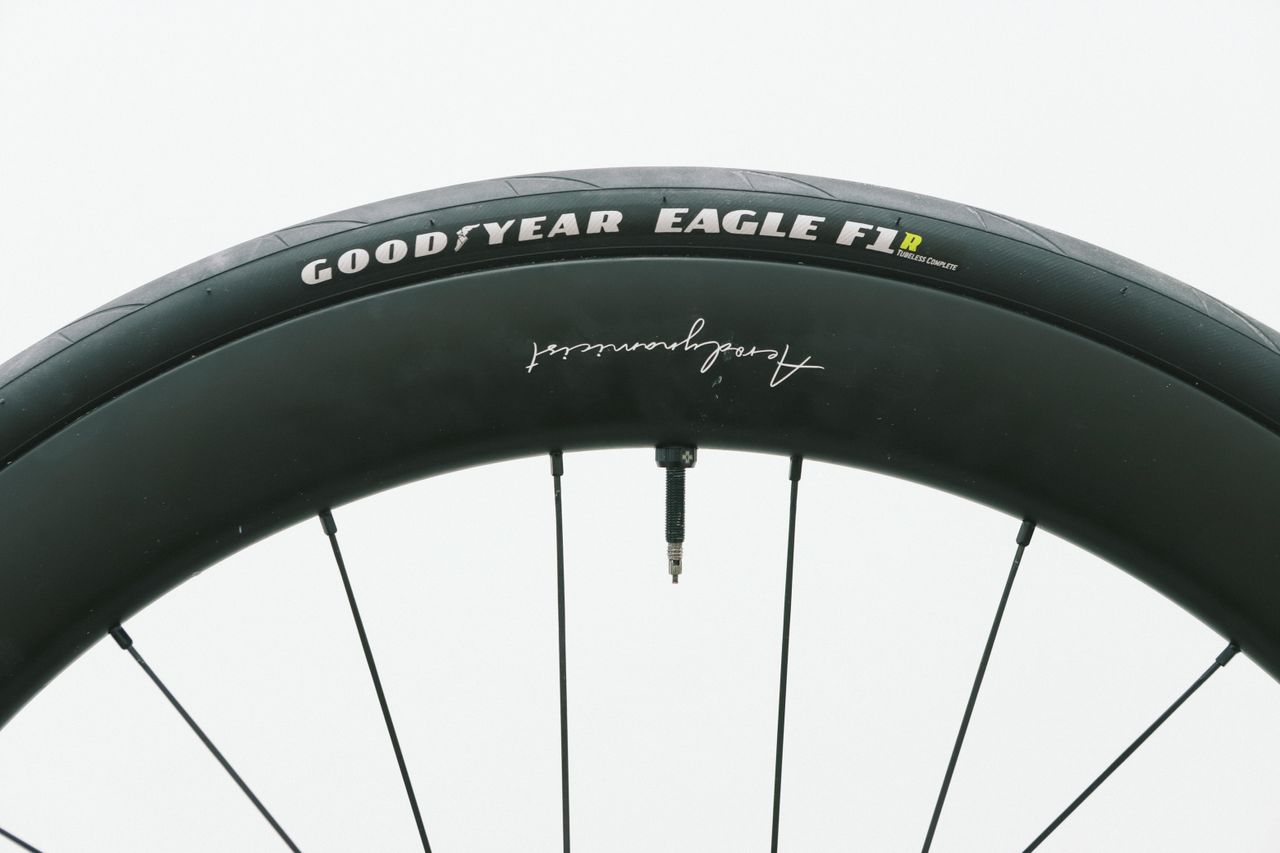 a close up of a black road bike tyre