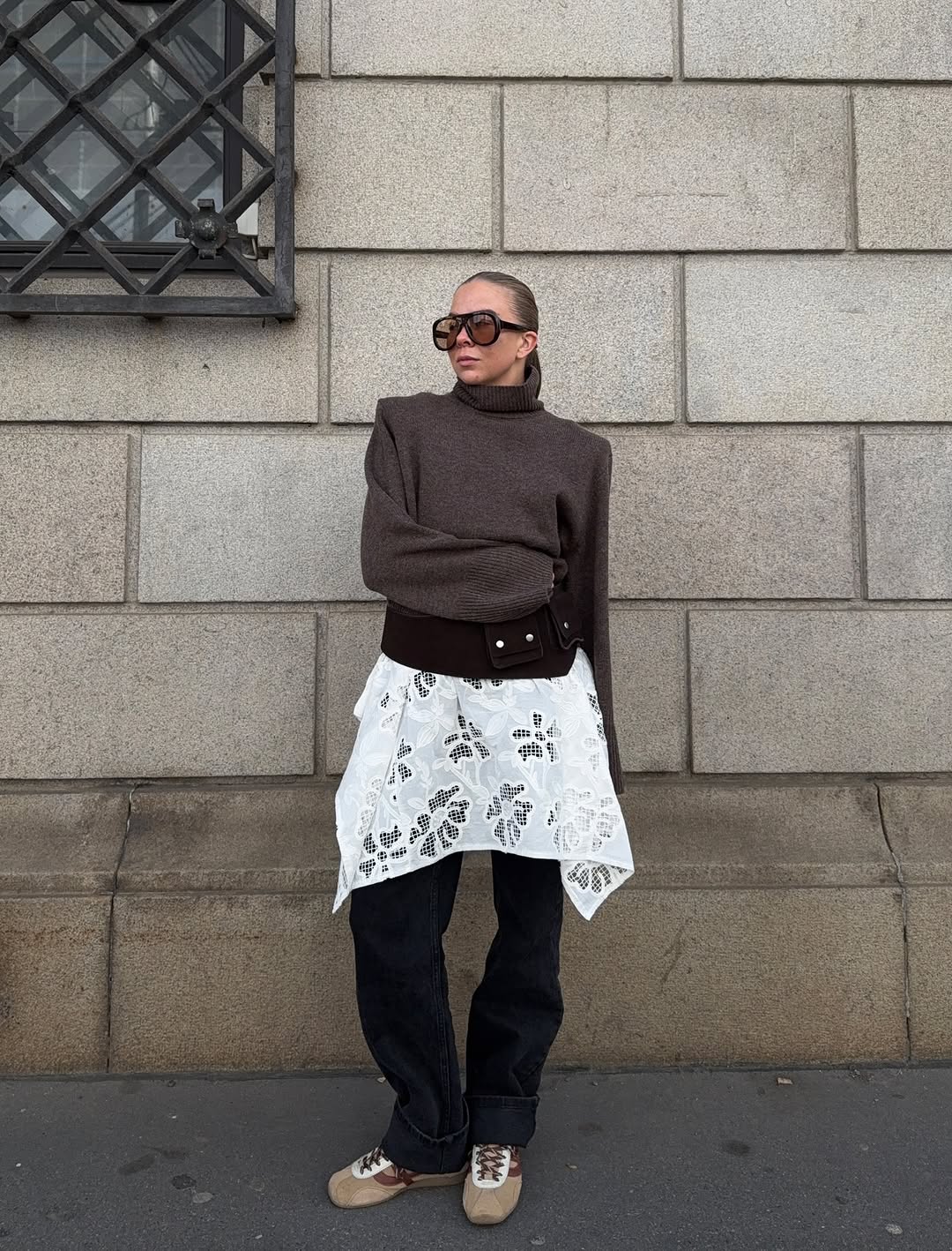 woman wearing dress over pants fall outfit 2025