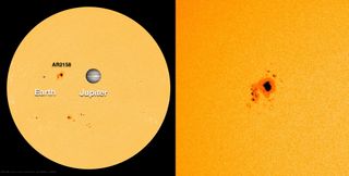 This NASA image shows the active sunspot AR2158, which unleashed a massive X1.6 solar flare on Sept. 10, 2014, as it appeared on Sept. 8, when it fired off a moderate M4.6 solar flare. On the right, Jupiter and Earth are superimposed to give a sense of the sunspot's size.