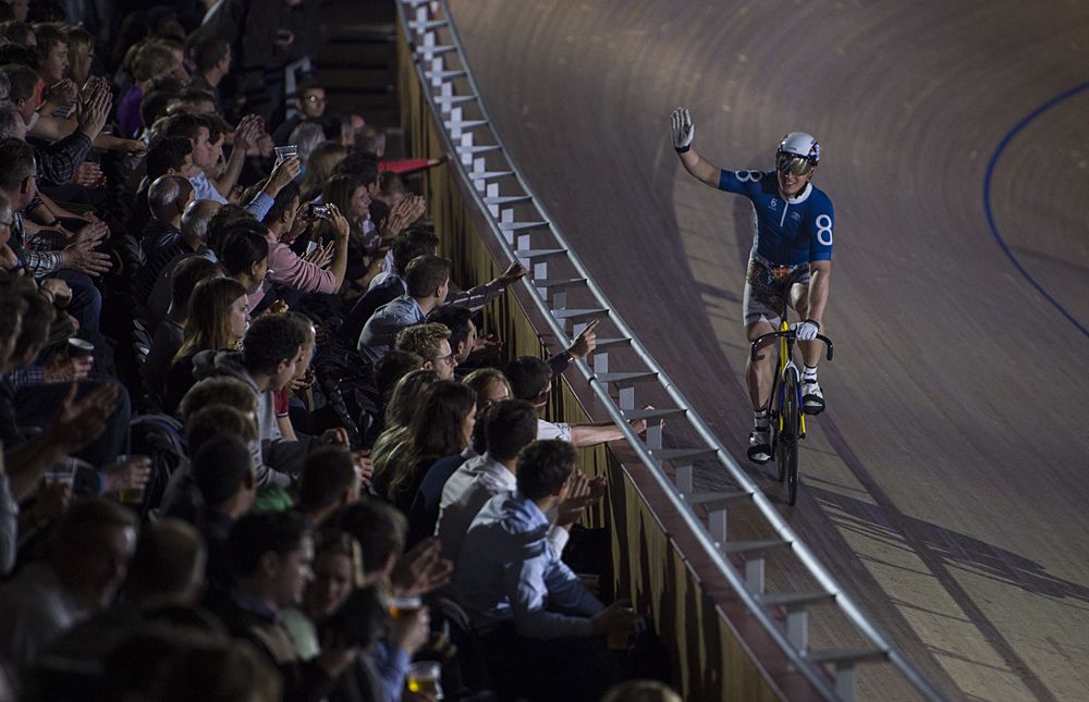 Eric Balzer of Germany celebrates winning the Keirin heats
