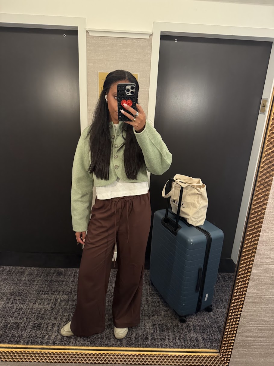 Sierra Mayhew wearing an airplane outfit.