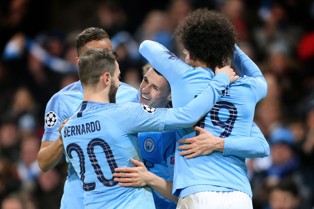 Manchester City celebrate Phil Foden scoring their 6th goal against Schalke in 2019