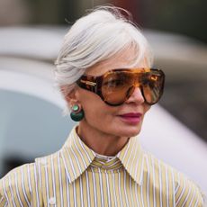 grece ghanem headshot wearing oversized sunglasses